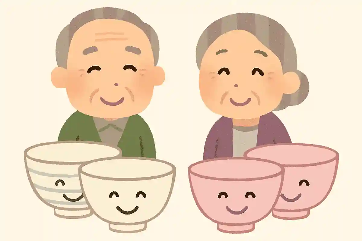 笑顔とかけて、夫婦茶碗2組とときます、その心はどちらもニコニコ(2個2個)です。