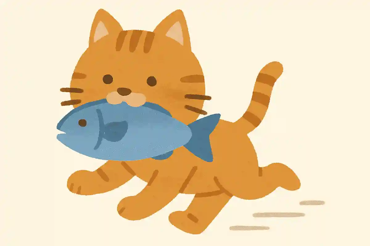 魚をくわえた猫が走る