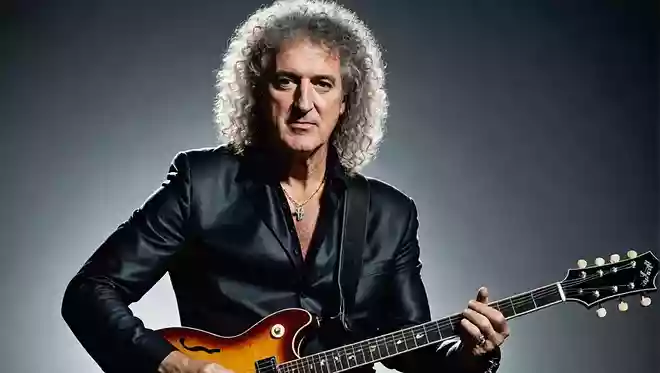 ブライアン・メイさんはピックの代わりに何を使ってギターを弾いている？