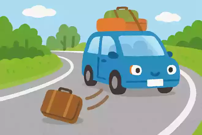 荷物をたくさん載せた車がカーブで落としたものはなんでしょう?