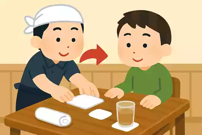 飲食店でおしぼりをコースターにする