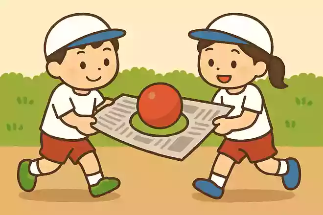 穴の開いた新聞でボール運び
