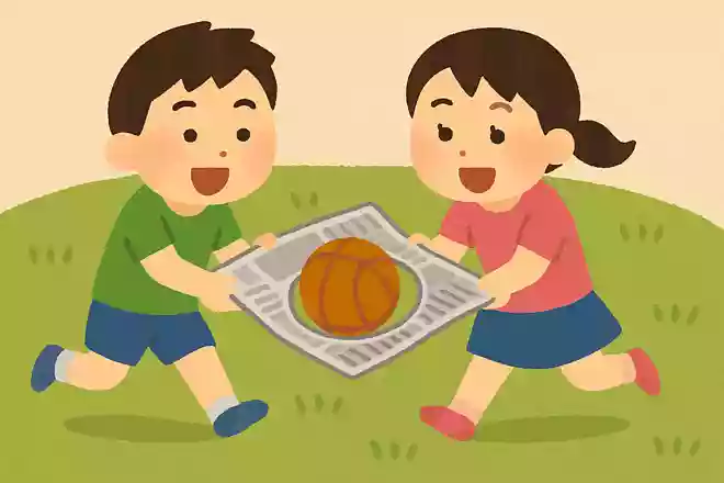 穴の開いた新聞でボール運び