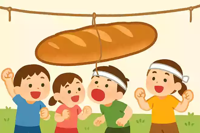 巨大なフランスパンをつるす